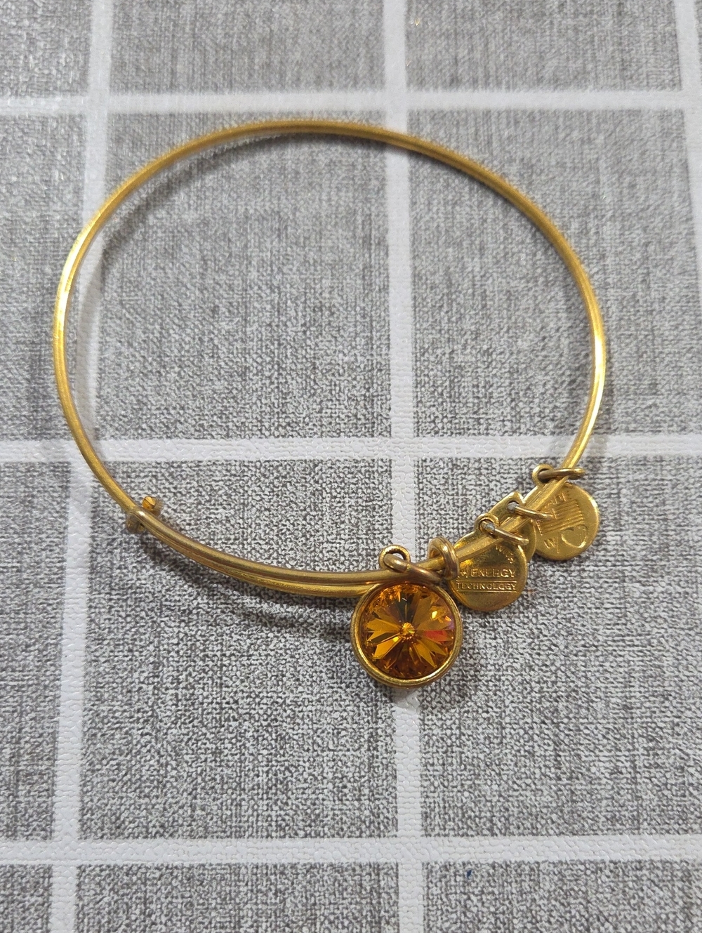 Alex and Ani Gold Bangle with Amber Crystal Charm